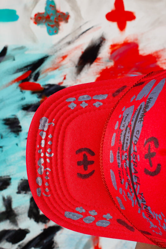 Red Metamorphosis Trucker Hat